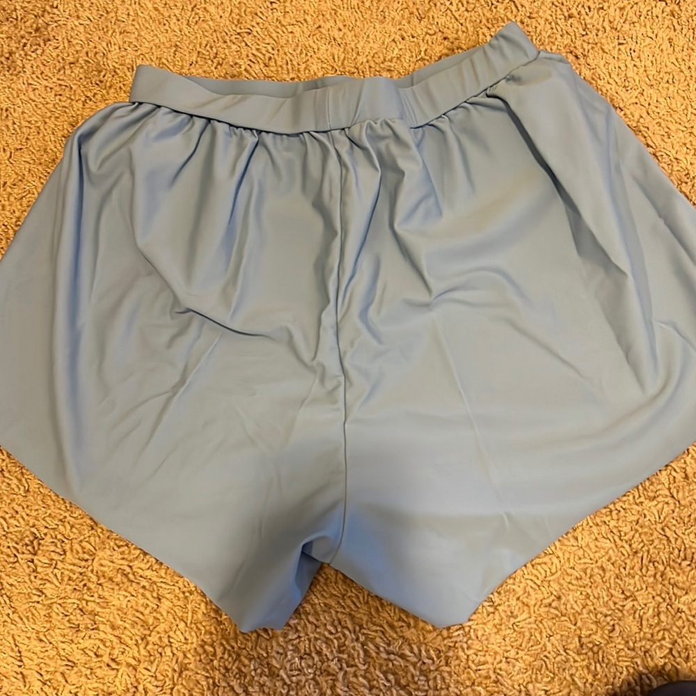Womens small blue shorts cover up.  These shorts came with a swimsuit.